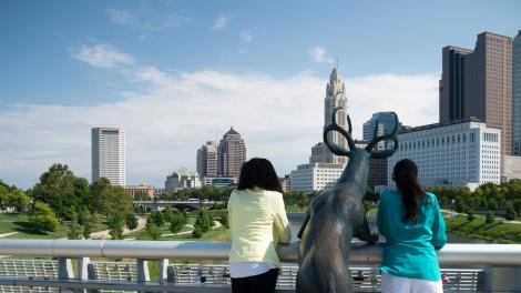 Posing with a sculpture in Bicentennial Park in Columbus, Ohio