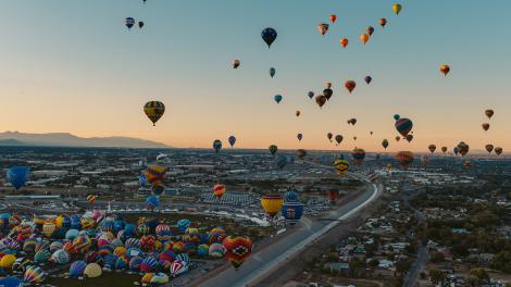 Hot air balloons rise over Albuquerque, New Mexico Hot air balloons rise over Albuquerque, New Mexico