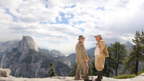 U.S. President Theodore Roosevelt and conservationist John Muir portrayed by actors in Yosemite National Park, California U.S. President Theodore Roosevelt and conservationist John Muir portrayed by actors in Yosemite National Park, California