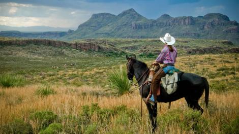 A cowgirl in Big Bend Ranch State Park, Texas A cowgirl in Big Bend Ranch State Park, Texas