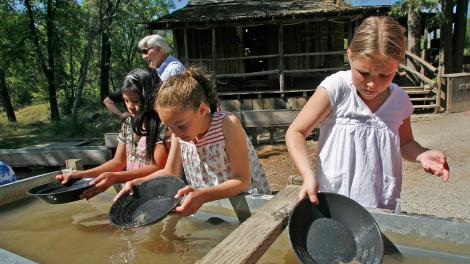 Children panning for gold at Columbia State Park Children panning for gold at Columbia State Park