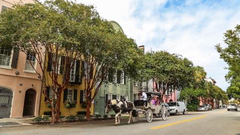 Horse carriage on Rainbow Row in Charleston, South Carolina Horse carriage on Rainbow Row in Charleston, South Carolina