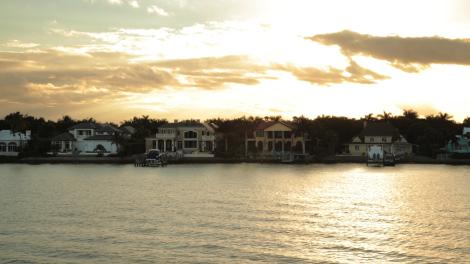 Sunset and luxury mansions in Naples, Florida