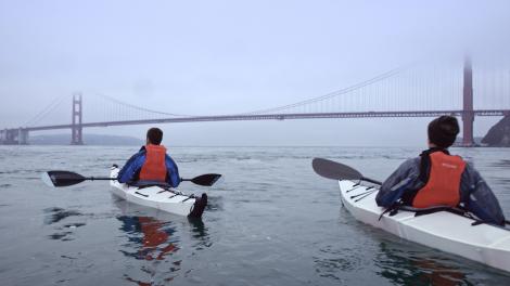 Kayaking on a misty day near the Golden Gate Bridge in San Francisco Kayaking on a misty day near the Golden Gate Bridge in San Francisco