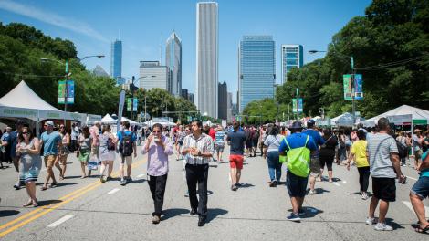 Sampling foods from local vendors at Taste of Chicago Sampling foods from local vendors at Taste of Chicago