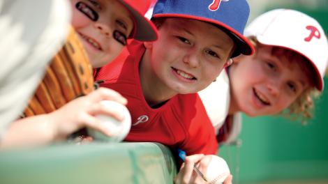 Young Philadelphia Phillies Fans Cheer during Spring Training.