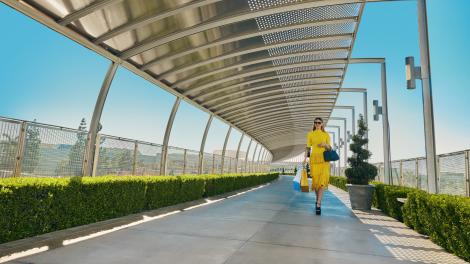 Shopper on the Unity Bridge at South Coast Plaza in Costa Mesa, California
