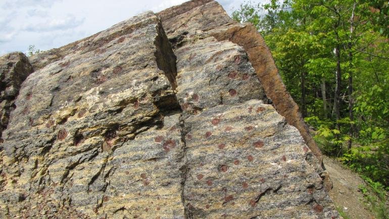 See those red spots on the rock? That’s bona fide New York garnet. See those red spots on the rock? That’s bona fide New York garnet.