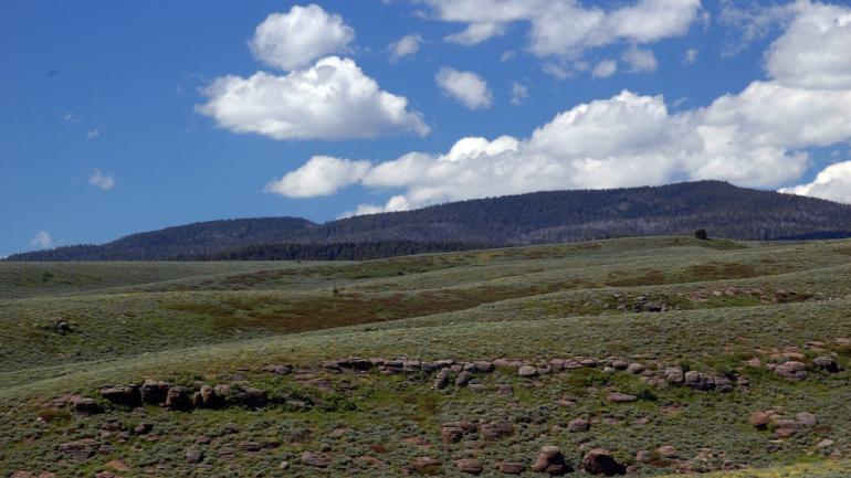 The rolling green hills around Spencer, Idaho, hide a colorful secret: opal. Dig for these multifaceted gems at the Spencer Opal Mines. The rolling green hills around Spencer, Idaho, hide a colorful secret: opal. Dig for these multifaceted gems at the Spencer Opal Mines.