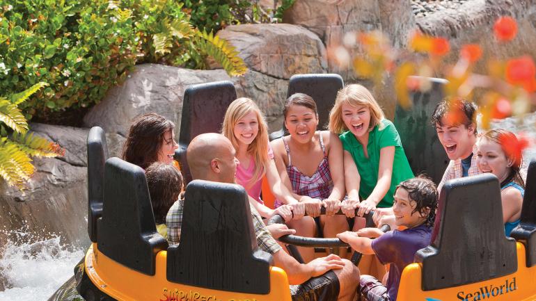 Friends enjoying a spin on Shipwreck Rapids at SeaWorld San Diego Friends enjoying a spin on Shipwreck Rapids at SeaWorld San Diego