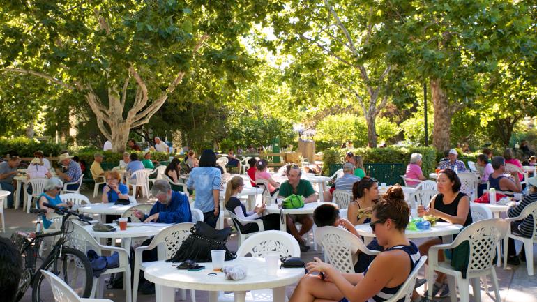 Picnicking and enjoying music at the Davis Farmers Market in Central California