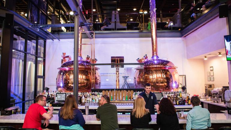 The bar at The Lone Buffalo, serving Tangled Roots Brewing Company beer and innovative bites The bar at The Lone Buffalo, serving Tangled Roots Brewing Company beer and innovative bites