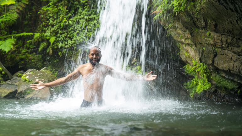 A refreshing dip in Juan Diego Falls, one of El Yunque’s many waterfalls A refreshing dip in Juan Diego Falls, one of El Yunque’s many waterfalls