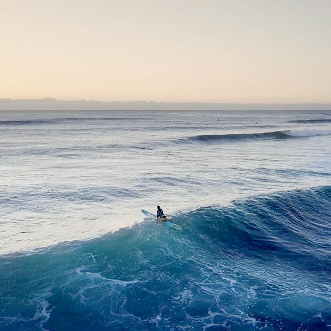 Surfing in the pristine waters of Hawaii