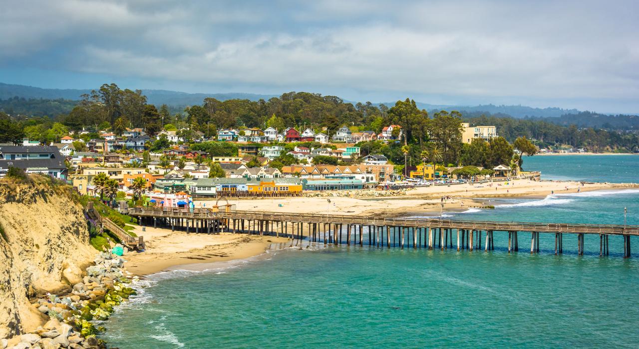 Pier and colorful houses at Capitola Beach Pier and colorful houses at Capitola Beach