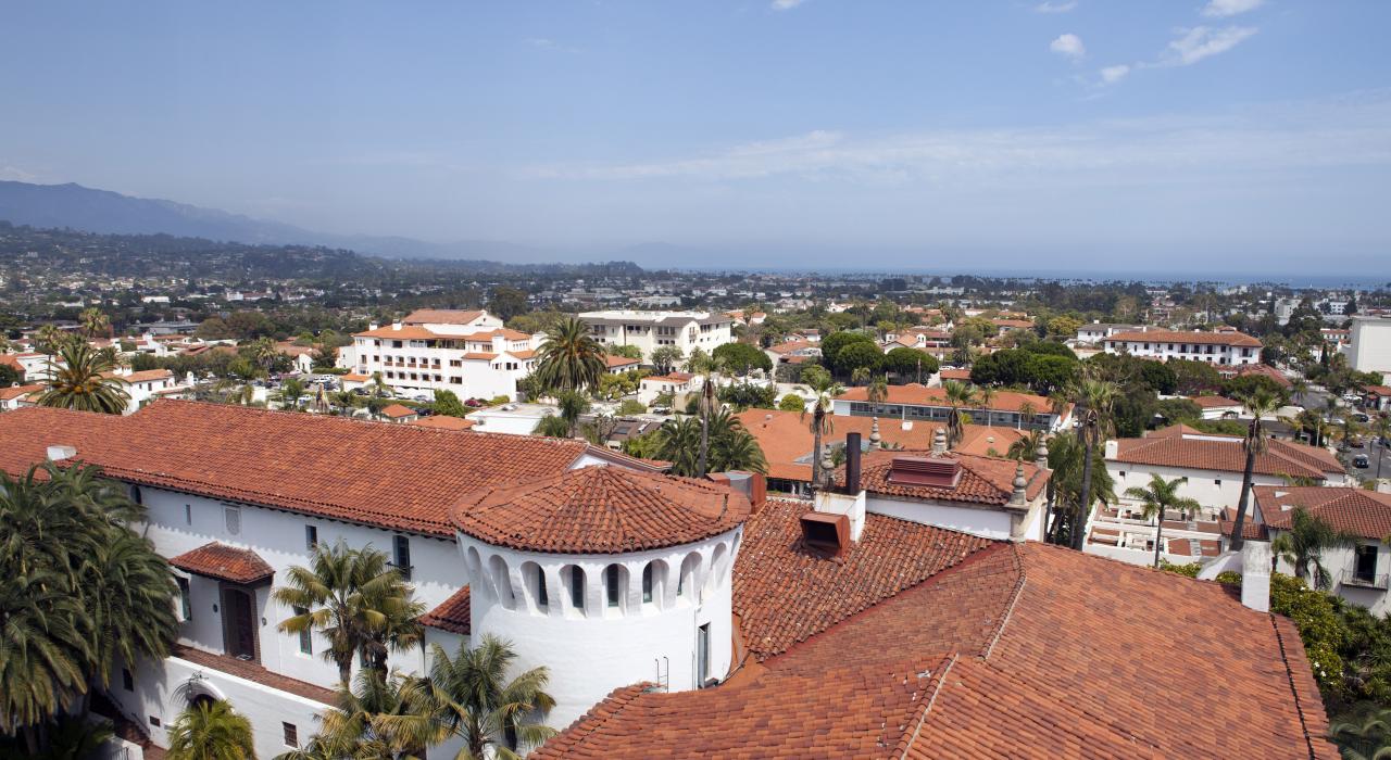 Skyline view of red tile roofs that reflect the city's Spanish heritage Skyline view of red tile roofs that reflect the city's Spanish heritage