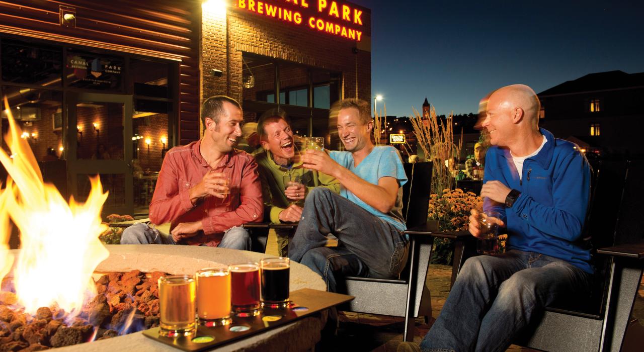 Enjoying the outdoor firepit and a beer flight at Canal Park Brewing Company Enjoying the outdoor firepit and a beer flight at Canal Park Brewing Company