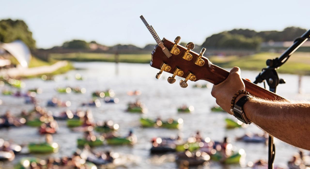 Floating in the Trinity River for the Rockin' the River music festival