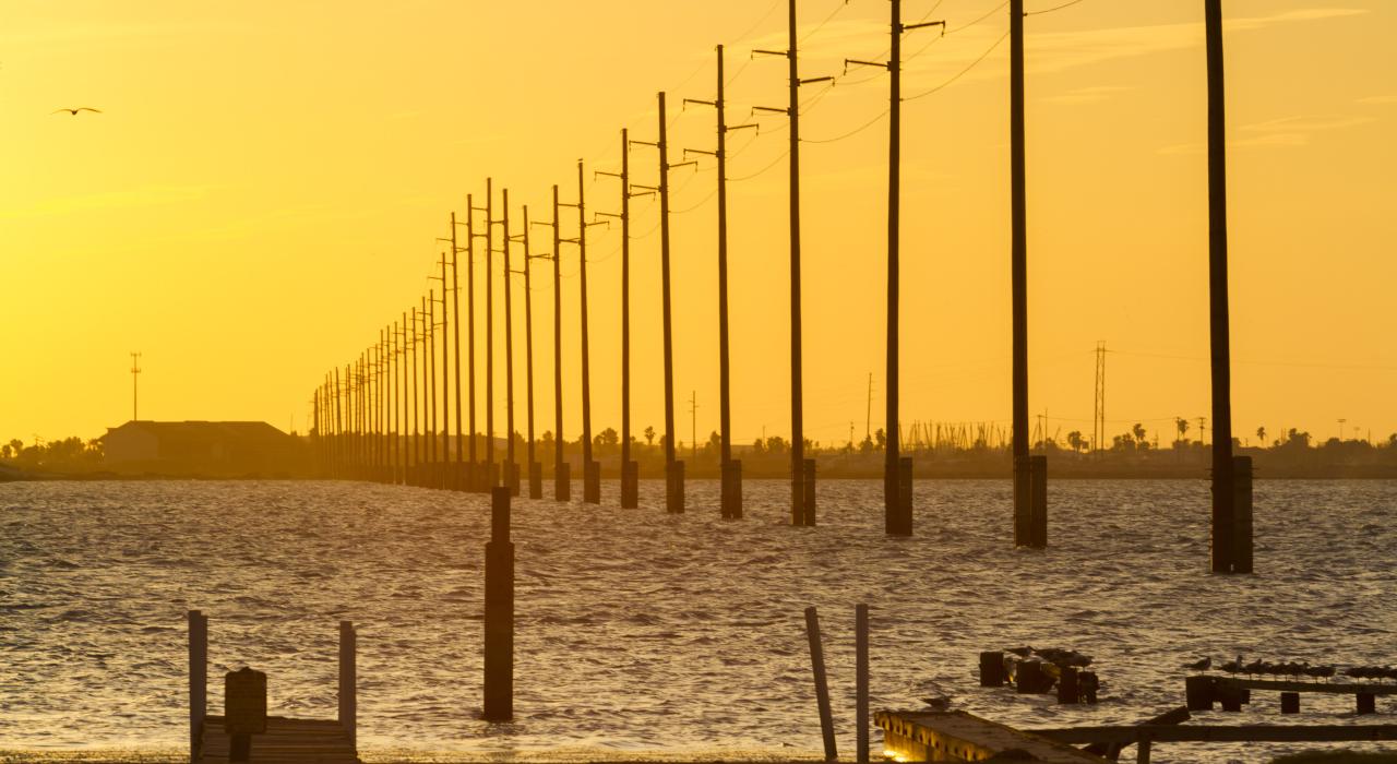 The glow of the setting sun over the bay