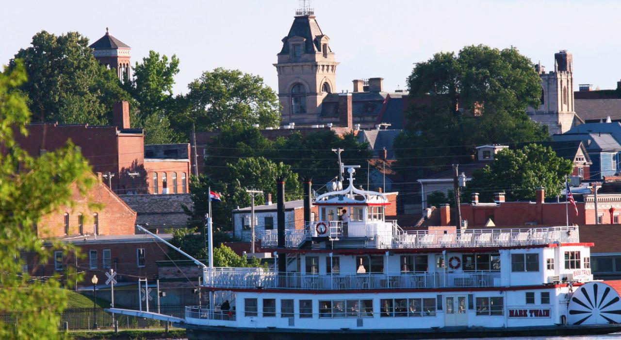 The Mark Twain Riverboat and Hannibal skyline