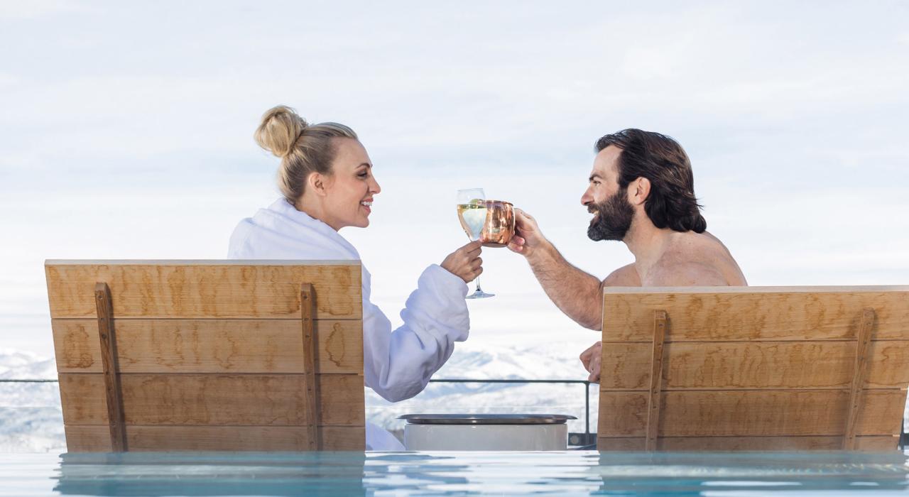 Relaxing poolside with a drink and incredible mountain views Relaxing poolside with a drink and incredible mountain views